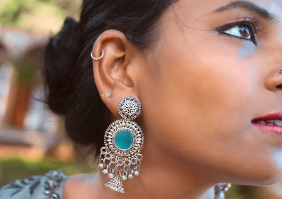 Big Earrings with a Silver Necklace